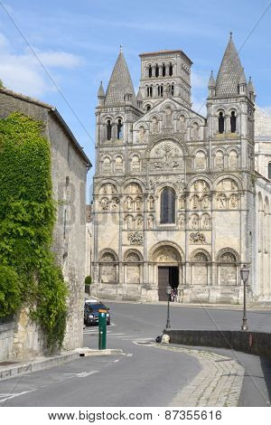 ANGOULEME, FRANCE - JUNE 26, 2013: Saint-Pierre Cathedral in a summer day. The church is an example of Romanesque architecture and sculpture and is the seat of the Bishop of Angouleme