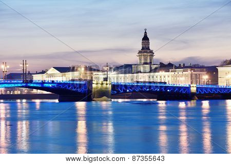 ST. PETERSBURG, RUSSIA - MARCH 18, 2015: Night view to Neva river and the Kunstkamera building. Built in 1727, Kunstkamera was the first Russian museum