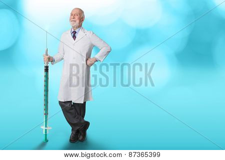 friendly male doctor with huge syringe