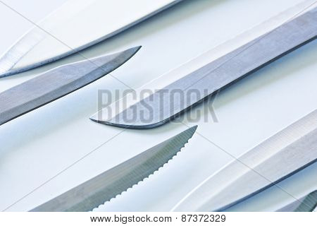 Set of steel kitchen knives, isolated