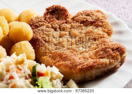 Breaded Cutlet And Potatoes