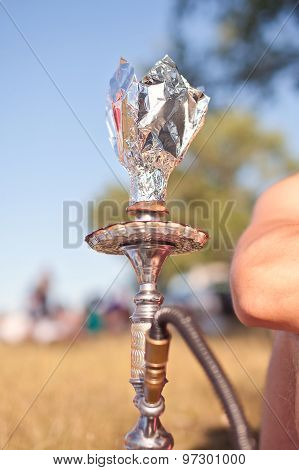 Close-up Photo Of Foil For Hookah On Nature Background
