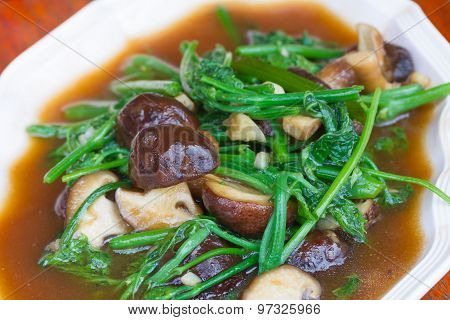Fried Chayote vegetable in oyster sauce with shiitake