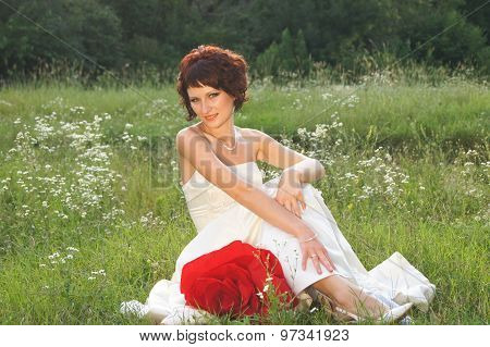 Young beautiful girl in a wedding dress