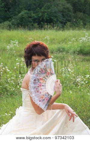 Young beautiful girl in a wedding dress