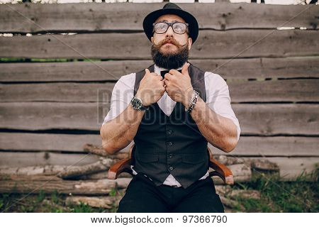 two bearded men shave