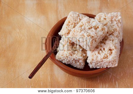 Coconut Candy Cocada On Brown Plate