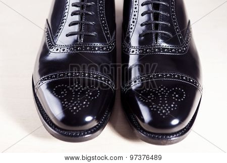 Style And Men's Fashion Footwear Concept. Pair Of New Black Stylish Male Oxfords Laqured Semi-brouge