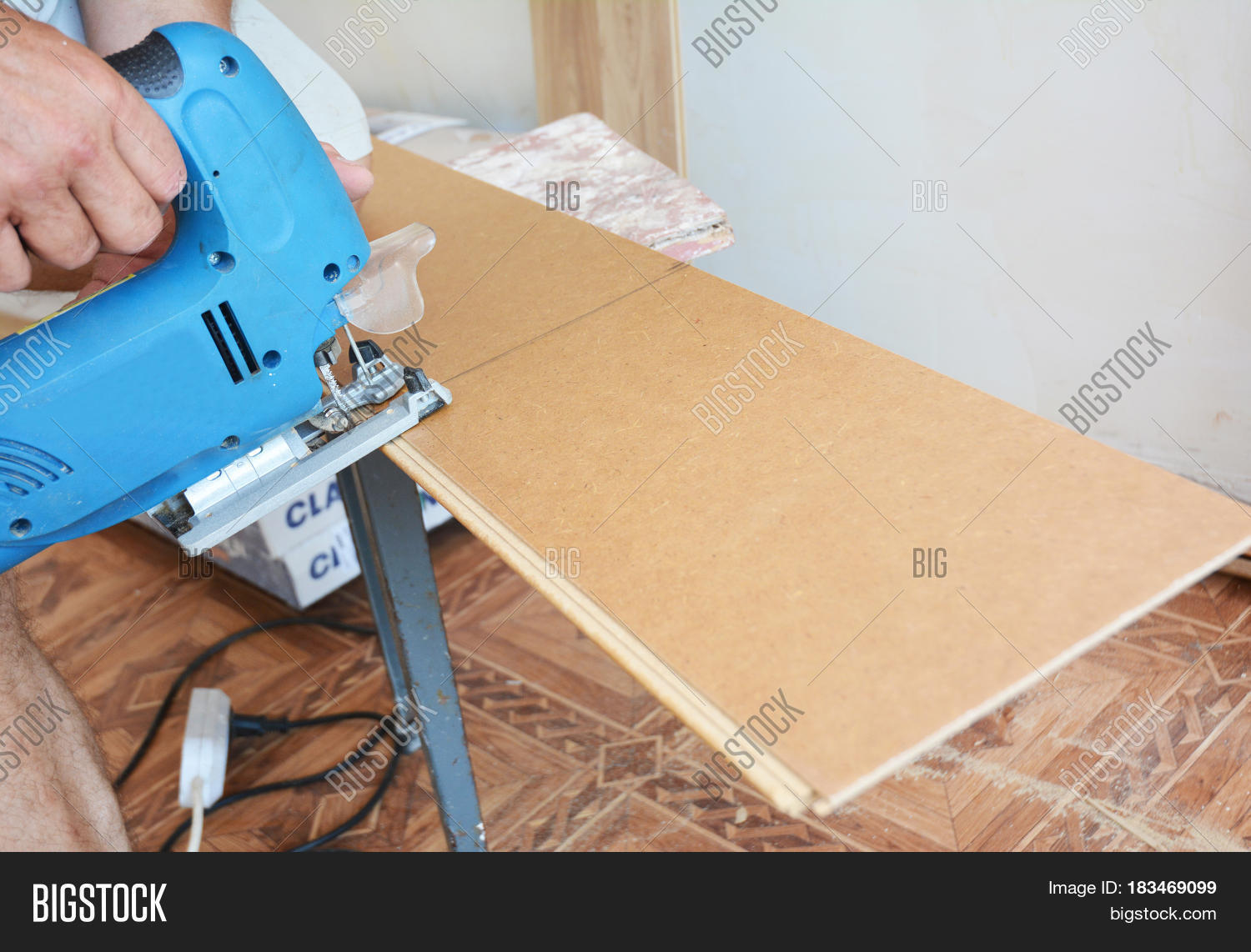 Cutting Laminate Image Photo Free Trial Bigstock Cutting Laminate Flooring Lengthwise With Hand Saw