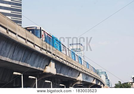 Bts Sky Train Mass Transit System ,moving To Arrive In Platform Of Central Business Area Of Bangkok.