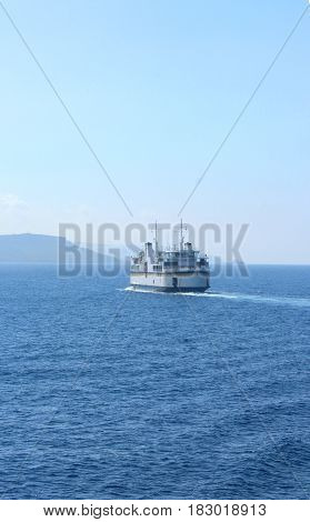 Blue sea blue sky: Mediterranean ferry on its way to the coast