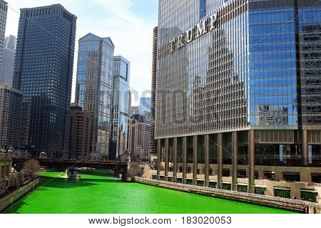 Chicago USA - March 11 2017: Green Chicago River Saint Patricks Day 2017. Michigan Avenue Bridge. River dyeing in Chicago for St Patrick's Day