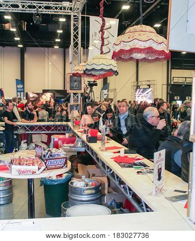 St. Petersburg Russia - 15 April, People at the bar,15 April, 2017.
International Motor Show IMIS-2017 in Expoforurum.
Visitors and participants of the annual moto-salon in St. Petersburg.