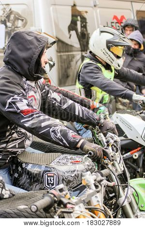 St. Petersburg Russia - 15 April, A number of athletes before the start,15 April, 2017.
International Motor Show IMIS-2017 in Expoforurum.
Sports motorcycle show of bikers on the open area.
