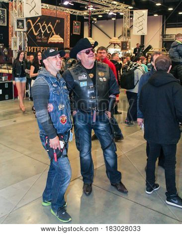 St. Petersburg Russia - 15 April, A crowd of people at a motor show,15 April, 2017.
International Motor Show IMIS-2017 in Expoforurum.
Visitors and participants of the annual moto-salon in St. Petersburg.