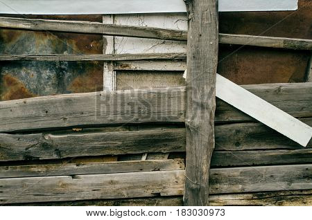 Aged wooden fence background. Old countryside rustic wood metal fence.