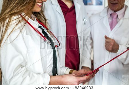 doctors talking about therapy and exams of a patient to decide how to proceed