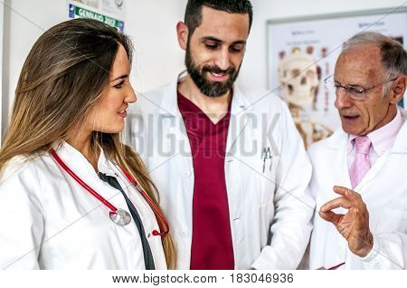 doctors talking about therapy and exams of a patient to decide how to proceed