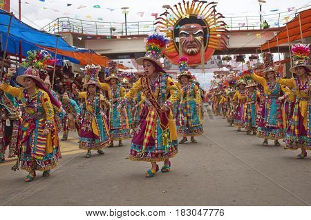 ORURO, BOLIVIA - FEBRUARY 26, 2017: Tinkus dancers in colourful costumes performing at the annual Oruro Carnival. The event is designated by UNESCO as being Intangible Cultural Heritage of Humanity.