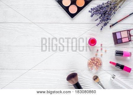 trendy woman desk with decorative cosmetic and lavender flowers on white background top view mockup