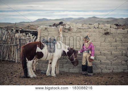 Kazakh Eagle Hunters In Traditionally Wearing Typical Mongolian Dress Culture Of Mongolia She Rider
