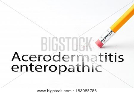 Closeup of pencil eraser and black acerodermatitis enteropathic text. Acerodermatitis enteropathic. Pencil with eraser.