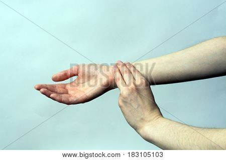 Medicine Health Care. Female Hand Checking Pulse On Wrist