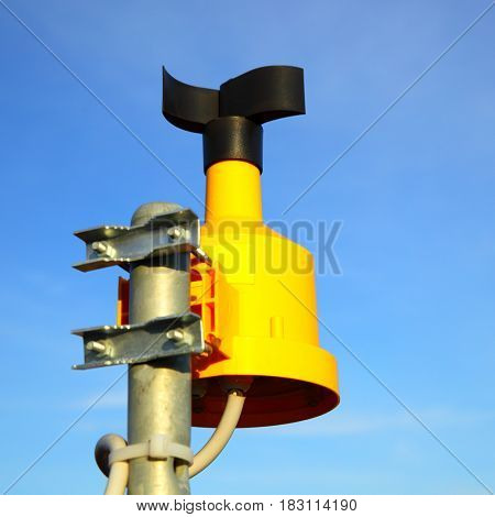 Close up of anemometer (wind-gauge) on top of pole