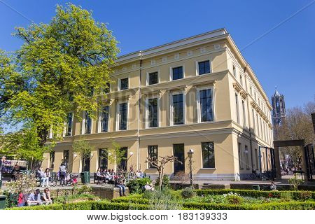 UTRECHT, NETHERLANDS - APRIL 09, 2017: People enjoying the sun in Pandhof Sinte Marie in Utrecht, Holland