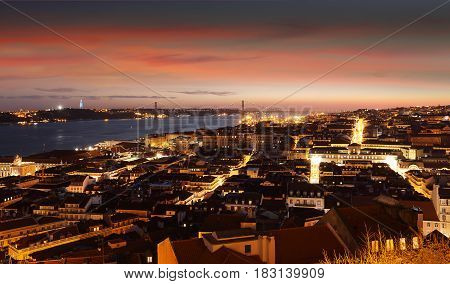 Panoramic view of night Lisbon with Tagus (Tejo) river Portugal