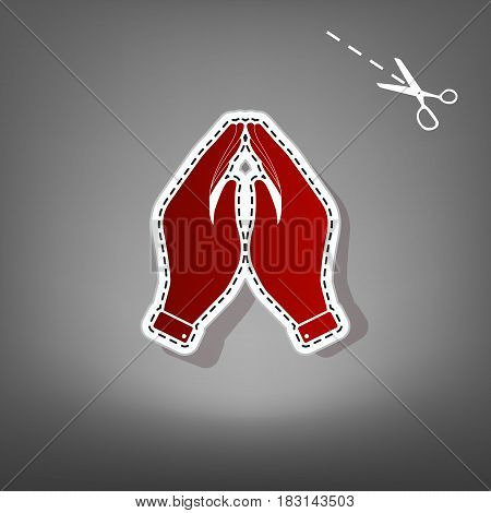 Hand icon illustration. Prayer symbol. Vector. Red icon with for applique from paper with shadow on gray background with scissors.