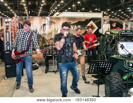 St. Petersburg Russia - 15 April, Rock musicians at the motor depot,15 April, 2017.
International Motor Show IMIS-2017 in Expoforurum.
Visitors and participants of the annual moto-salon in St. Petersburg.