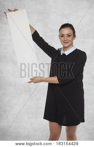 Smiling Fashion Woman Holding A Blank Billboard, Copy Space