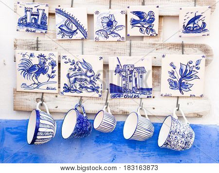 Traditional Portuguese pottery sold as souvenirs in Obidos.