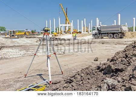 Surveyors ensure precise measurements before undertaking large construction projects.