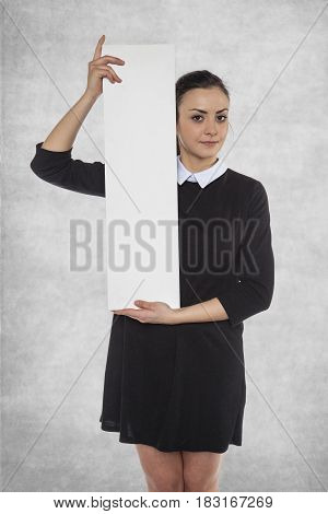 Beautiful Woman Holding A Blank Billboard, Space For Ad