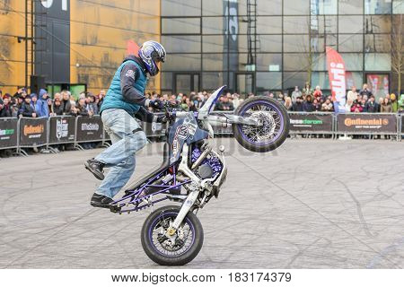 St. Petersburg Russia - 15 April, Freestyle on motobikes,15 April, 2017.
International Motor Show IMIS-2017 in Expoforurum.
Sports motorcycle show of bikers on the open area.