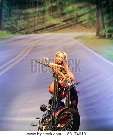 St. Petersburg Russia - 15 April, The girl at motobike,15 April, 2017.
International Motor Show IMIS-2017 in Expoforurum.
Models on motorcycles presented at the motor show.