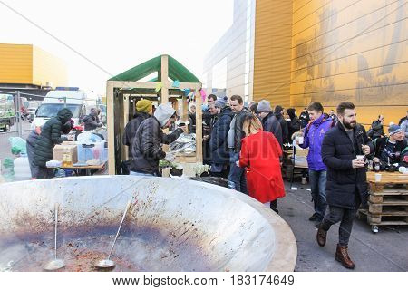 St. Petersburg Russia - 15 April, People have shopping pavilions,15 April, 2017.
International Motor Show IMIS-2017 in Expoforurum.
Visitors and participants of the annual moto-salon in St. Petersburg.