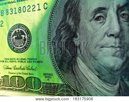 Banknote 100 dollars costing on a table