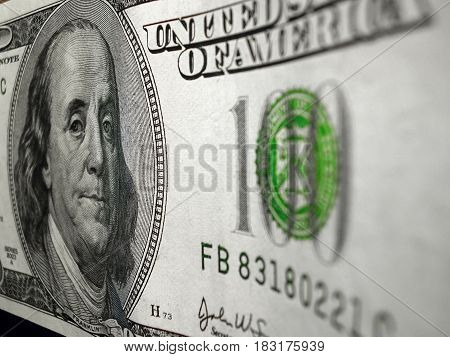 100 dollars U.S.A costing on a table