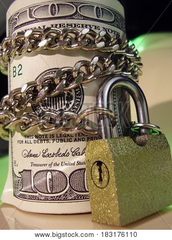 Money costing on a white table with the lock