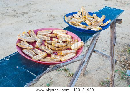 Dried Banana on Blue and Red Round Tray
