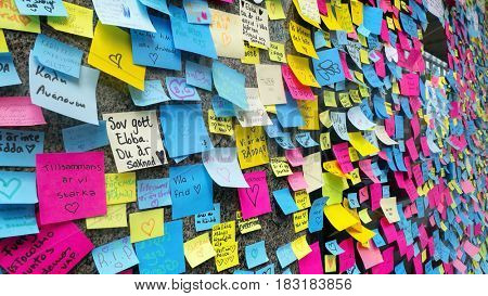 STOCKHOLM, SWEDEN - April 11, 2017: Sticky notes are pictured at a makeshift, memorial to commemorate the victims of terror attack in central Stockholm 