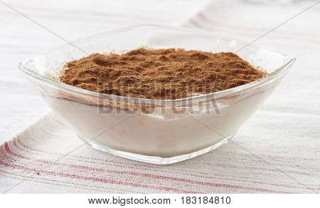 Creamy rice pudding with cinnamon. A simple, nutritious dessert made from rice, milk, eggs, vanilla and sugar.