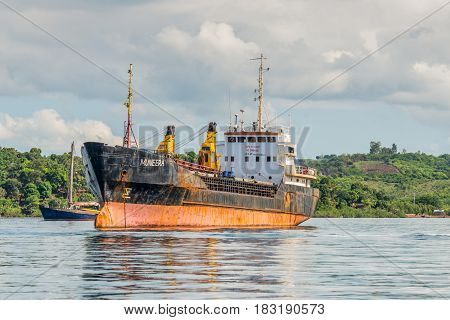 Hell-Ville Madagascar - December 19 2015: General Cargo Ship Muneera (formerly known as Semlow) anchored at Hell-Ville Nosy Be Island Madagascar.