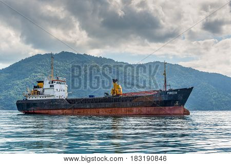 Hell-Ville Madagascar - December 19 2015: General Cargo Ship Muneera (formerly known as Semlow) anchored at Hell-Ville Nosy Be Island Madagascar.