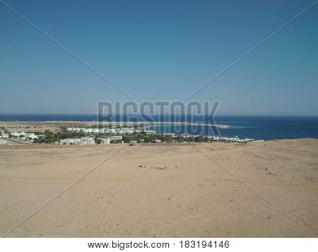 Beautiful Blue Seas surrounded by Desert Sands