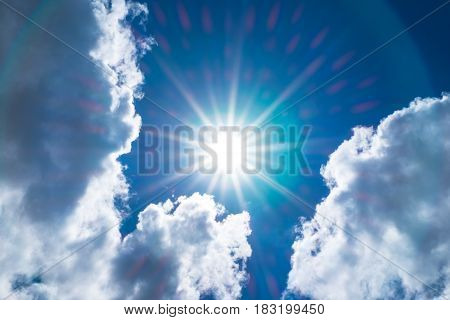 Looking Up At Nice Blue Sky With Sun Beam And Halo With Cloudy