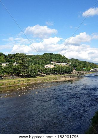 On a sunny day take a walk by the river.
